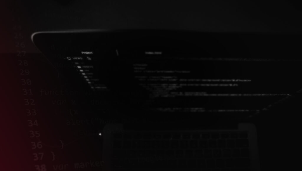 Laptop mit Codezeilen in dunklen Farben von Steinis Grafikdesign